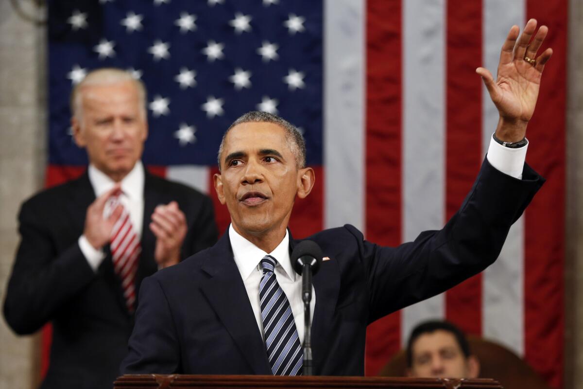 President Obama waves at the conclusion of his State of the Union address to a joint session of Congress, his last.