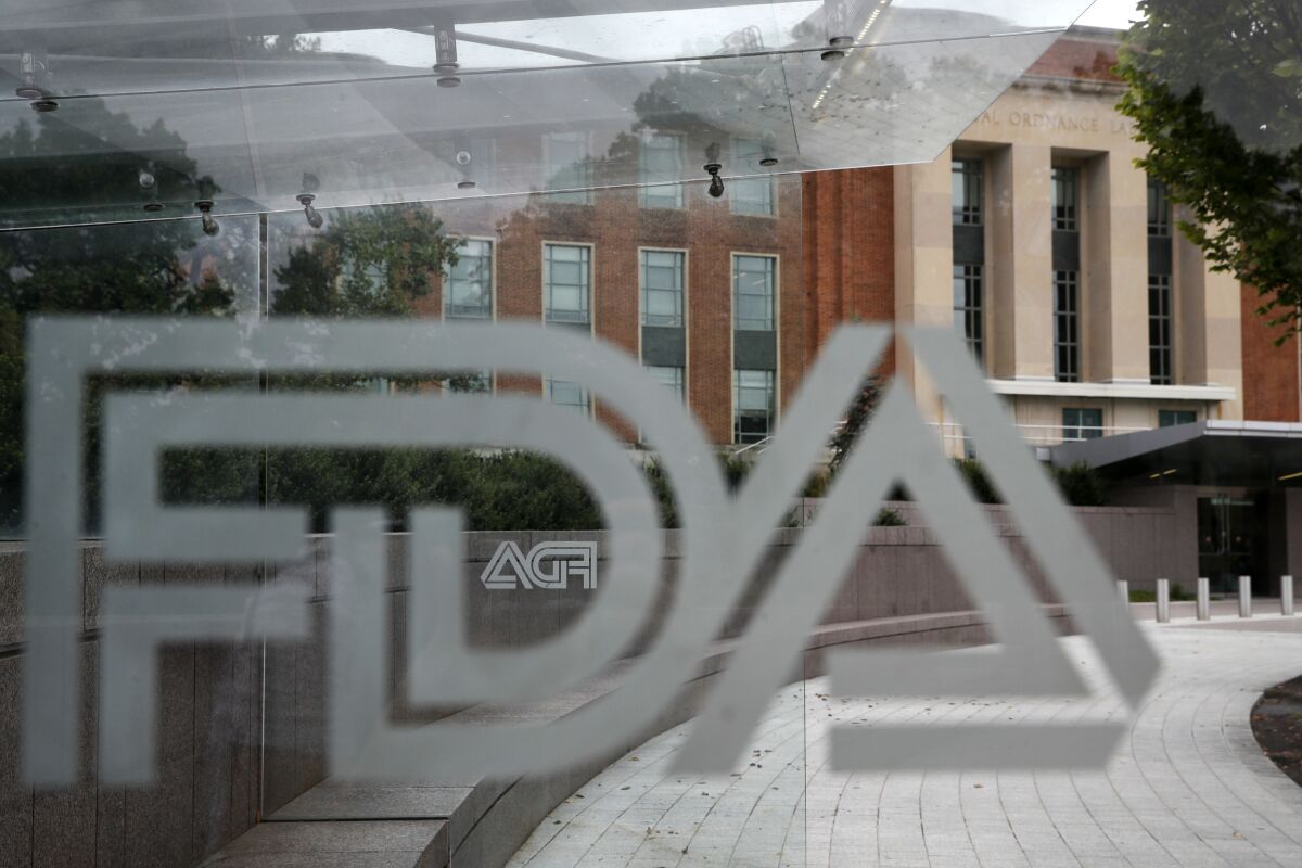 The U.S. Food and Drug Administration building behind FDA logos