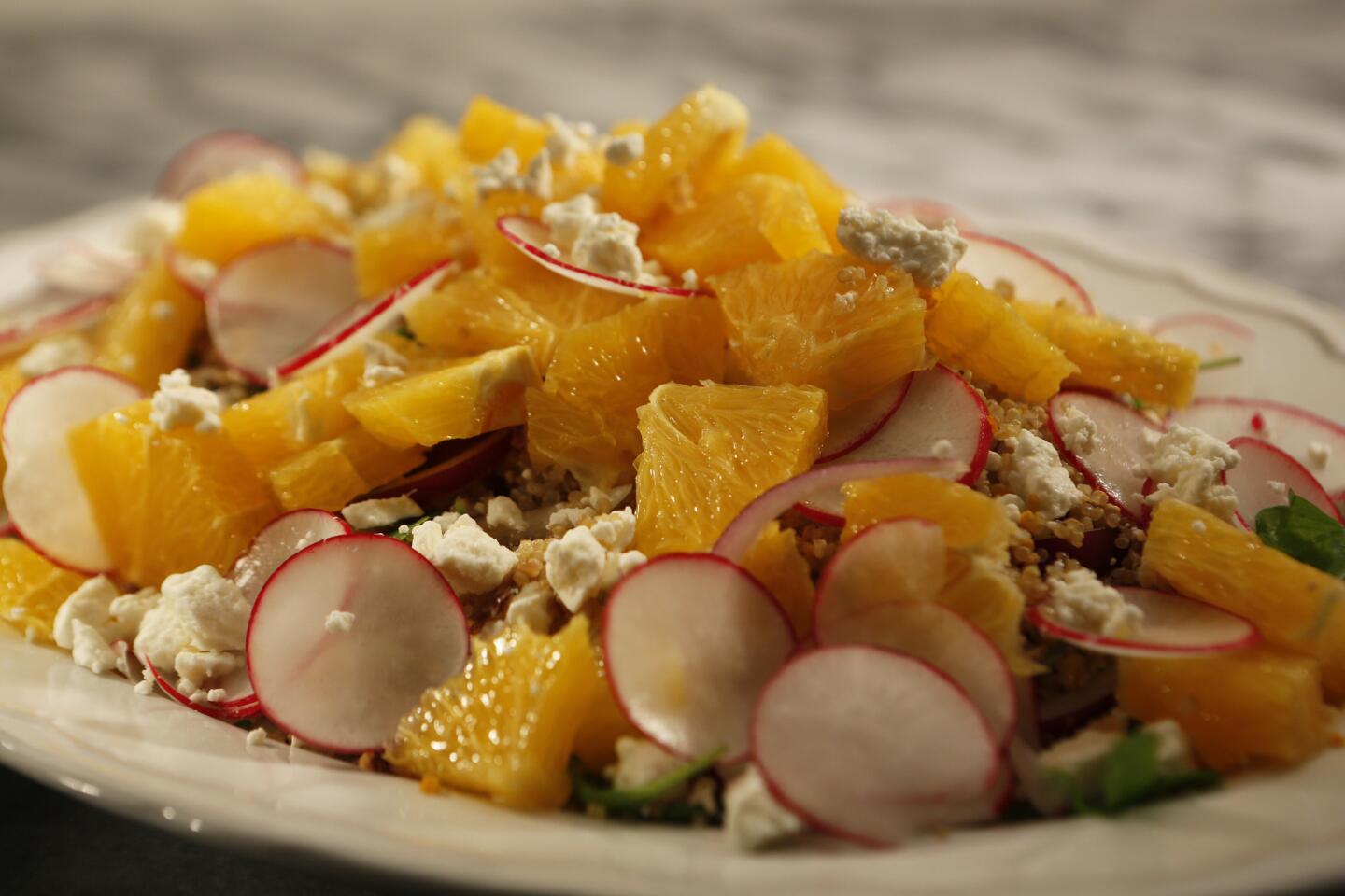 Salad of oranges, quinoa, radishes and feta