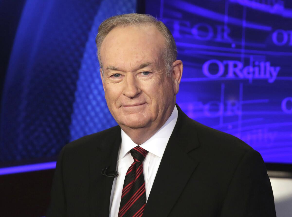 Bill O'Reilly poses for photos in New York on Oct. 1, 2015.