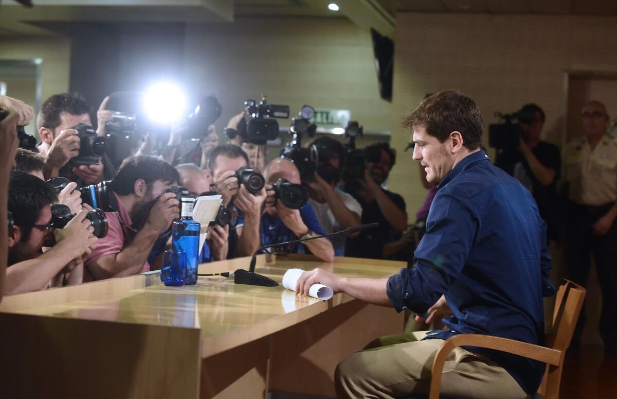 Real Madrid's goalkeeper Iker Casillas poses for photographers prior to a press conference at the Santiago Bernabeu stadium in Madrid on July 12, 2015. Real Madrid's emblematic captain and goalkeeper Iker Casillas is set to leave the club for FC Porto after 25 years during which he won everything in the game with the Spanish giants. AFP PHOTO/ PIERRE-PHILIPPE MARCOUPIERRE-PHILIPPE MARCOU/AFP/Getty Images ** OUTS - ELSENT, FPG - OUTS * NM, PH, VA if sourced by CT, LA or MoD **