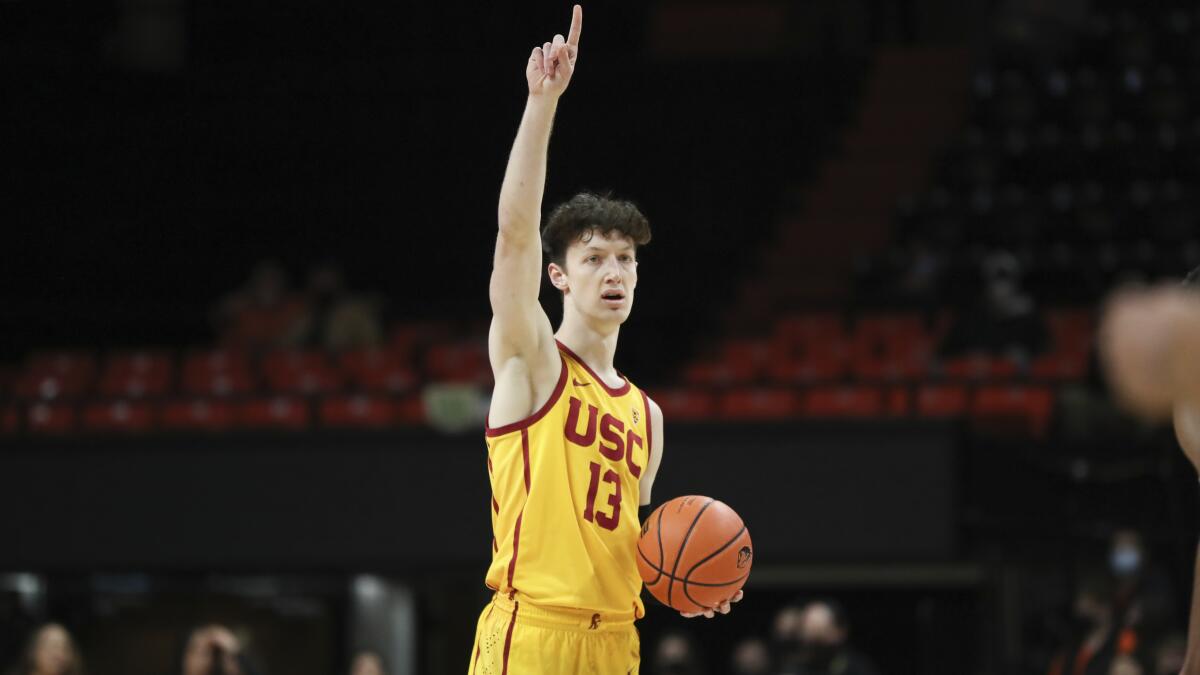 USC's Drew Peterson handles the ball against Oregon State during the 2021-22 season.