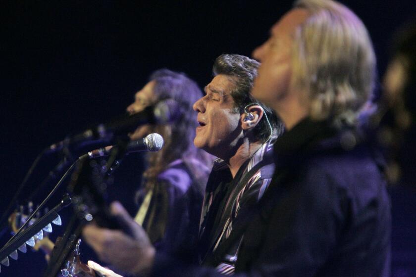 Glenn Frey, center, performs with other Eagles band members in Los Angeles in 2008.