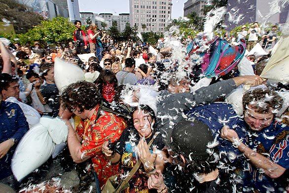 Several hundred people heeded the call to BYOP (bring your own pillow) to Pershing Square on Saturday in honor of World Pillow Fight Day.