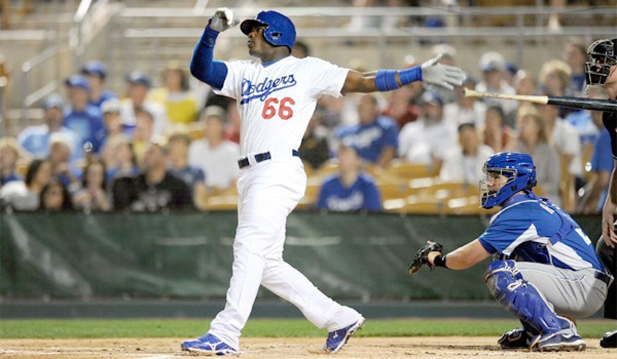 Yasiel Puig went 3 for 3 from the plate with a two-run home run during the Dodgers' 8-1 blowout of the Kansas City Royals.