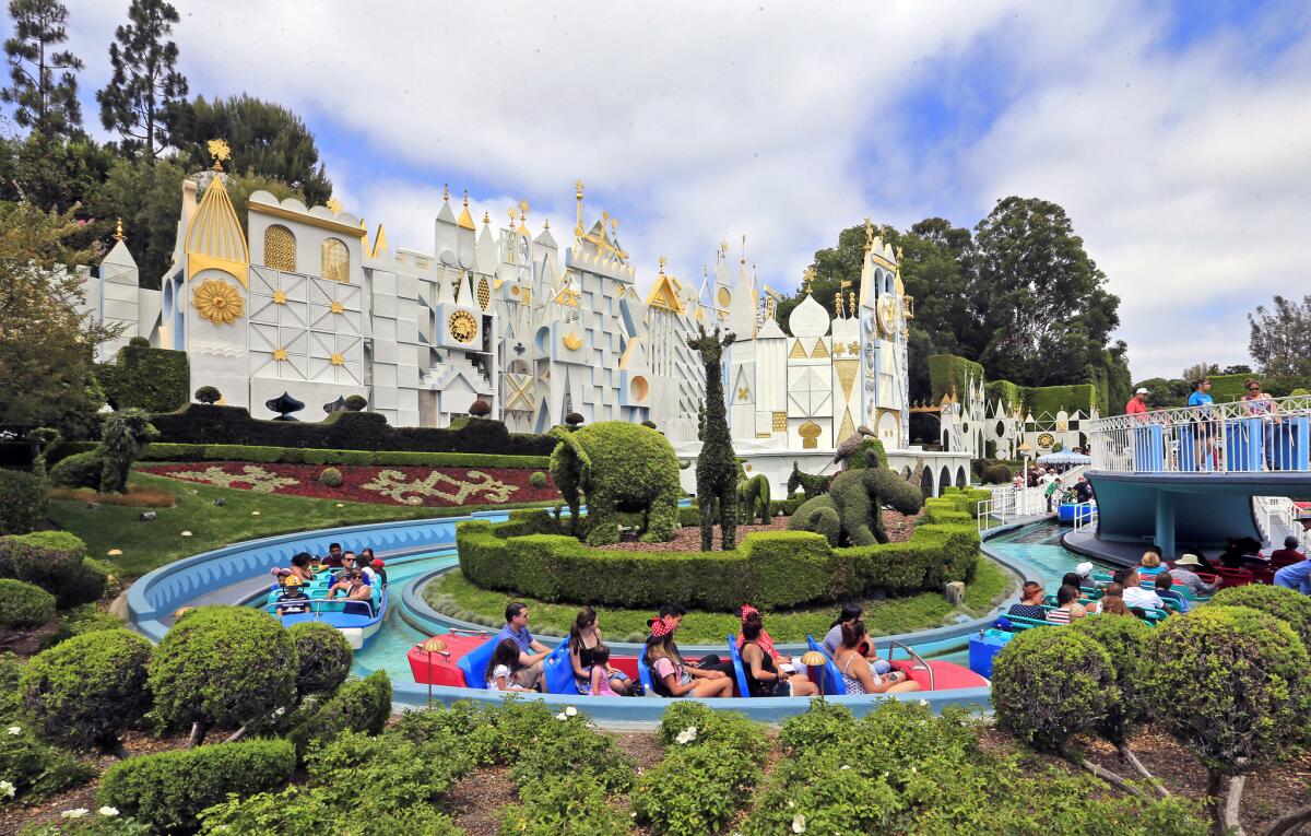 Disneyland guests sit in boats on the "It's a Small World" ride in 2015. Anaheim, which is home to the park, was the hottest place in the nation on Monday, reaching a high of 98 degrees.