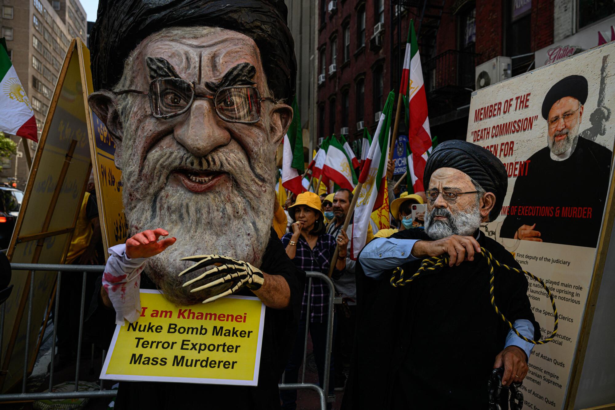 Protesters attend a rally calling for the prosecution of the Irans President Ebrahim Raisi
