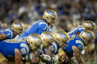 UCLA quarterback Dante Moore (3) stands in a scrimmage during an NCAA football game against Coastal Carolina on Saturday, Sept. 2, 2023, in Los Angeles. (AP Photo/Kyusung Gong)