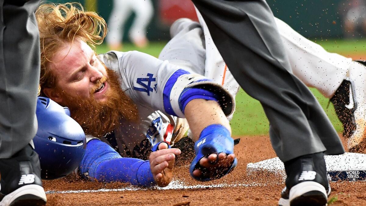 The Dodgers' Justin Turner is tagged out at third base during Game 5 of the World Series.