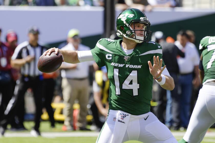 New York Jets' Sam Darnold (14) throws a pass during the first half of an NFL football game Sunday, Sept. 8, 2019, in East Rutherford, N.J. (AP Photo/Bill Kostroun)