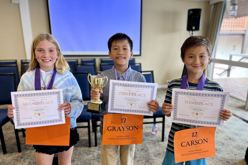 From left, Maven Lizotte, Grayson So and Carson Wu, the top three winners of the fourth- and fifth-grade division of the Coastwise Spelling Prize bee.