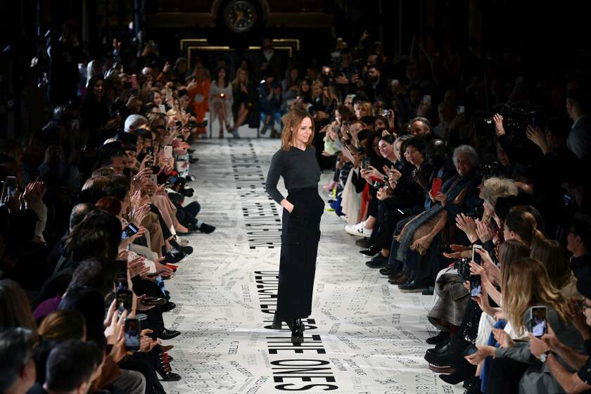 (FILES) This file photo taken on March 4, 2019 in Paris shows British fashion designer Stella McCartney acknowledging the audience at the end of the Stella McCartney Fall-Winter 2019/2020 Ready-to-Wear collection fashion show in Paris. - A little over a year after splitting with French luxury giant Kering, Stella McCartney is teaming up with its rival LVMH, the luxury group announced on July 15, 2019. (Photo by Philippe LOPEZ / AFP)PHILIPPE LOPEZ/AFP/Getty Images ** OUTS - ELSENT, FPG, CM - OUTS * NM, PH, VA if sourced by CT, LA or MoD **