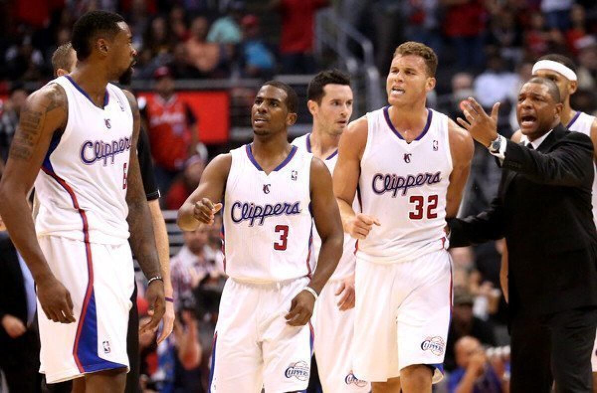 Although center DeAndre Jordan, left, had to be restrained by teammates Chris Paul (3) and Blake Griffin 32) during an altercation with the Warriors, at least one pundit, Charles Barkley, believes the team lacks the toughness to win an NBA title.