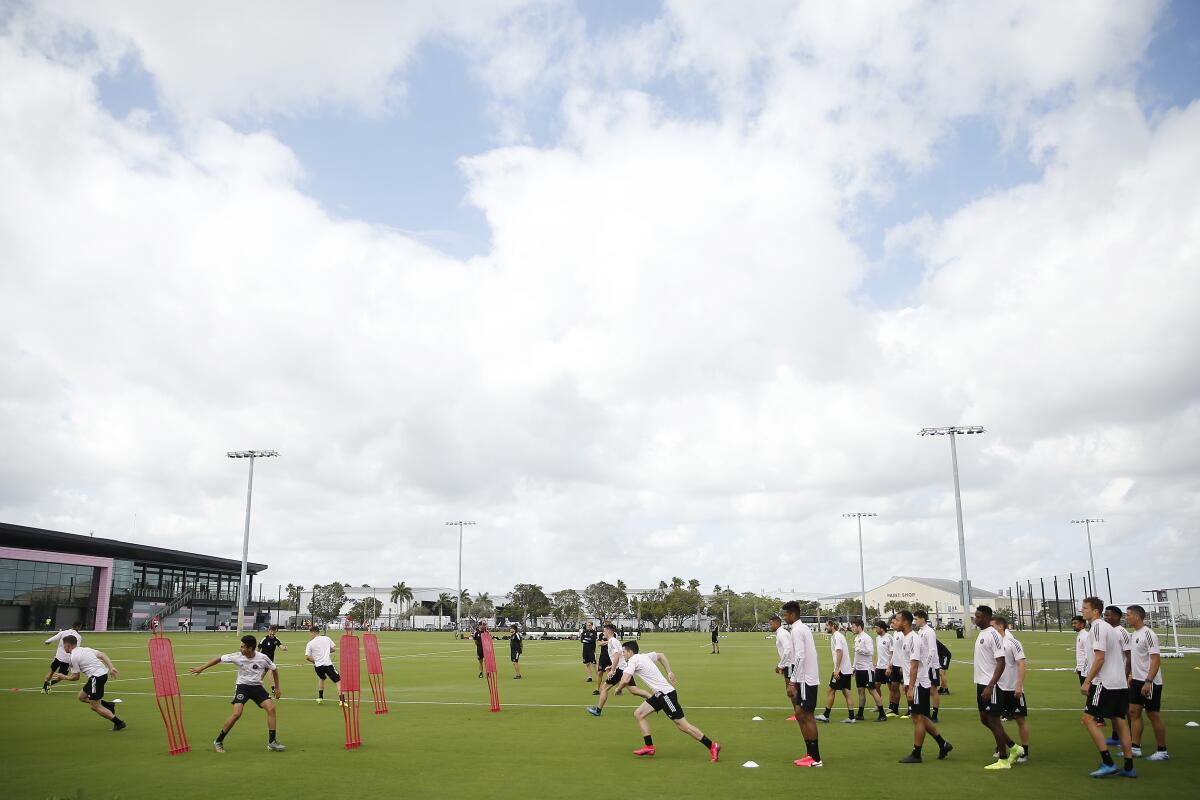 Inter Miami CF players runs through drills during a team practice session in February.