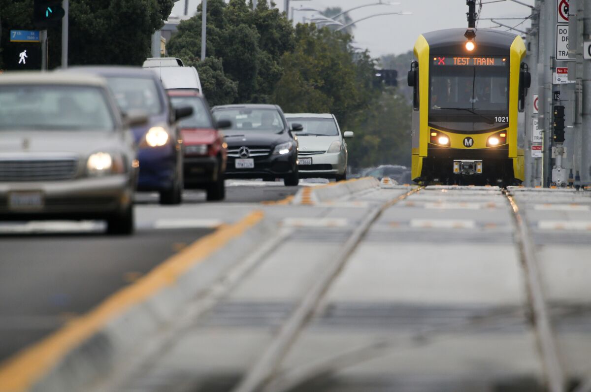 An Expo Line test train nears the Santa Monica station. The trip from downtown takes 50 minutes. (Mark Boster / Los Angeles Times)