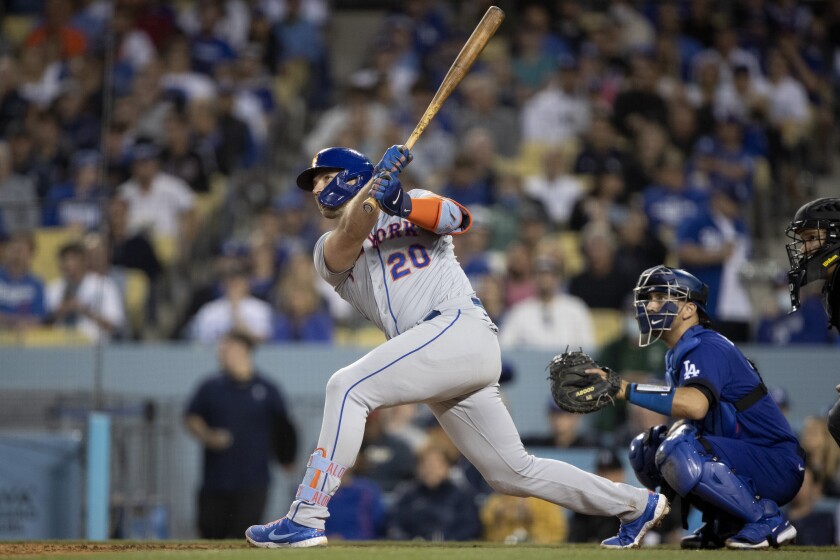 Mets slugger Pete Alonso watches his third-inning, two-run homer June 4, 2022. Dodgers catcher Austin Barnes is at right.