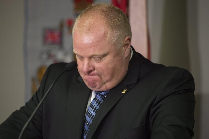Toronto Mayor Rob Ford holds a news conference June 30 after his stay in a rehabilitation facility. Ford has been diagnosed with a rare form of cancer, his doctors announced Wednesday.