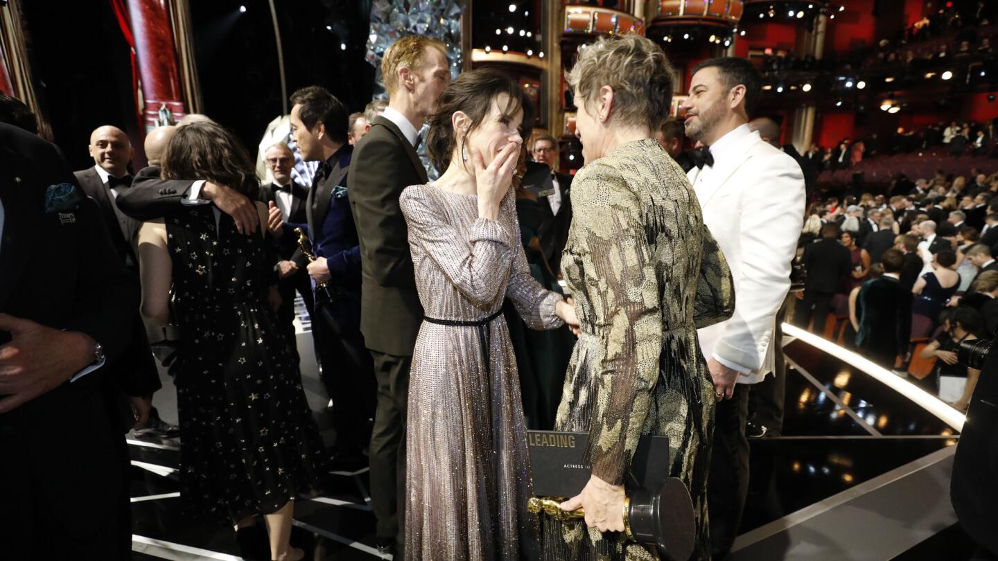 Oscar nominee Sally Hawkins and winner Frances McDormand talk backstage at the Academy Awards.