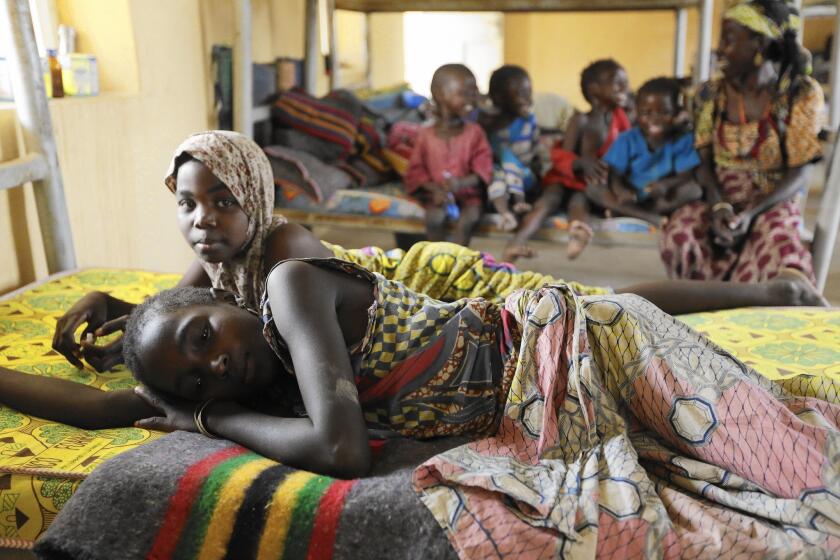 Former captives of Boko Haram rest at a camp in Yola, Nigeria, after being rescued by Nigerian troops.