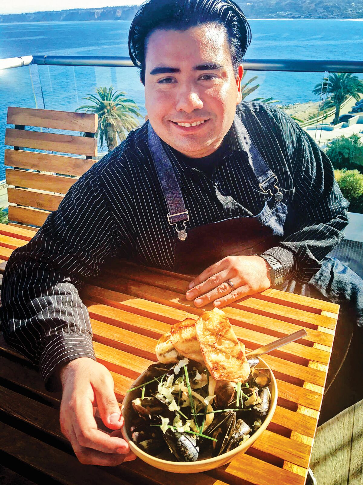 Anthony Sinsay in 2016, with his Mussels Adobo, a dish inspired by one of his mother’s recipes.