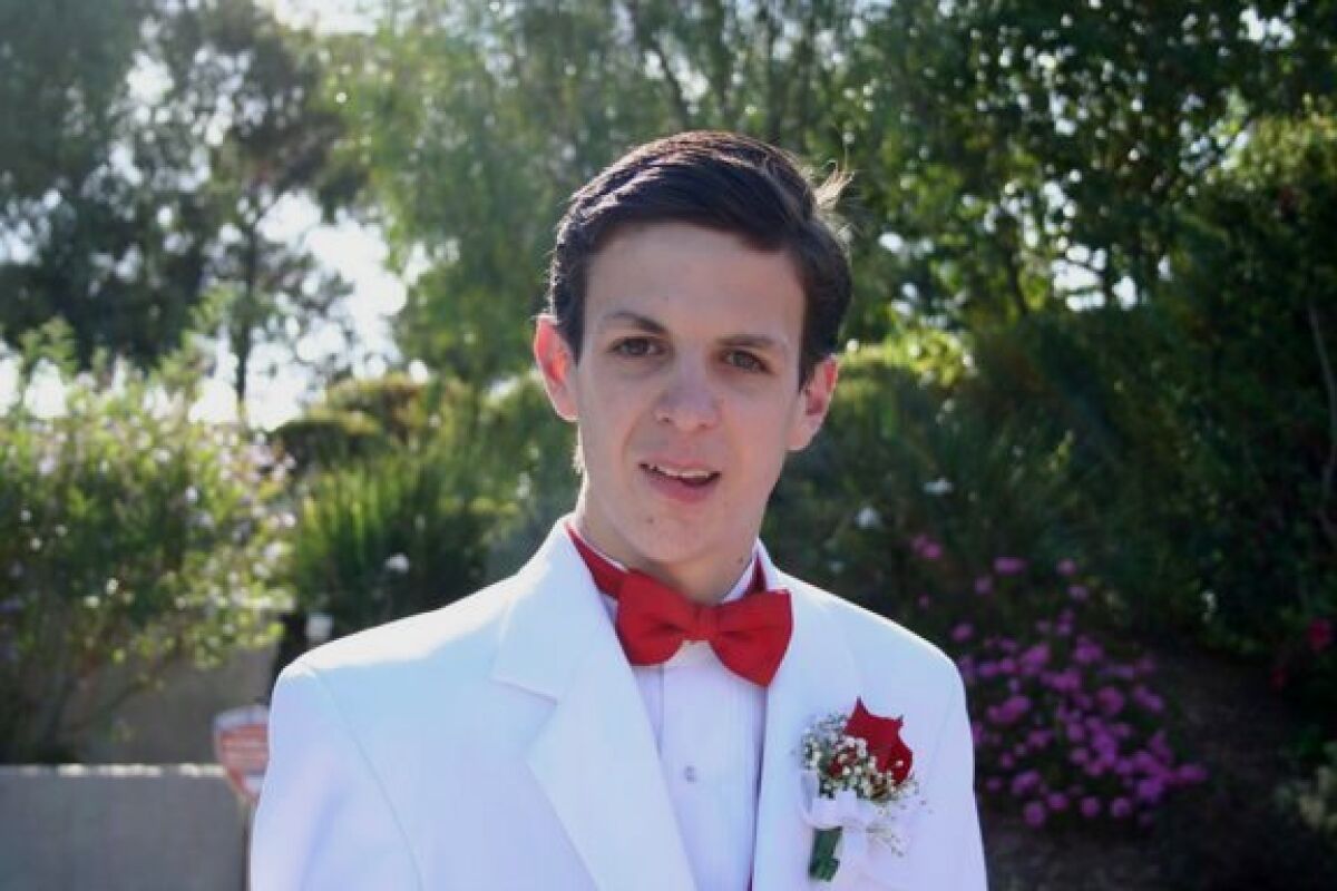 Garrett Baumann — shown on the night of his high-school prom — knew his disease would shorten his life, but he made sure it wouldn’t ruin it.