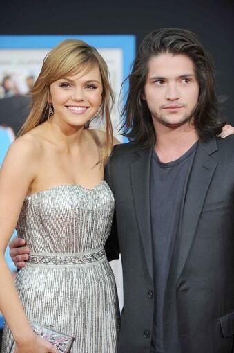 "Friday Night Lights" actress Aimee Teegarden and Thomas McDonell pause at the premiere of "Prom" at the El Capitan Theatre in Hollywood on April 21. Teegarden and McDonell star in the new Disney teen flick.