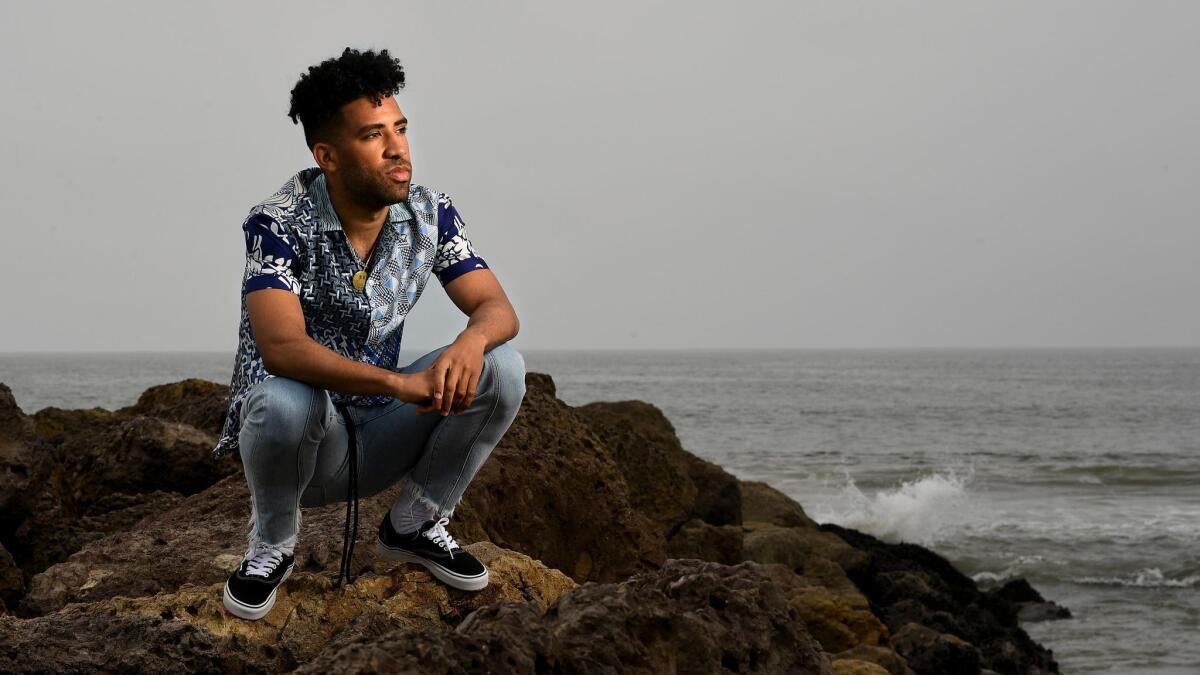 Rapper Kyle, whose album "Light of Mine" is due this month, on the beach in his hometown of Ventura.