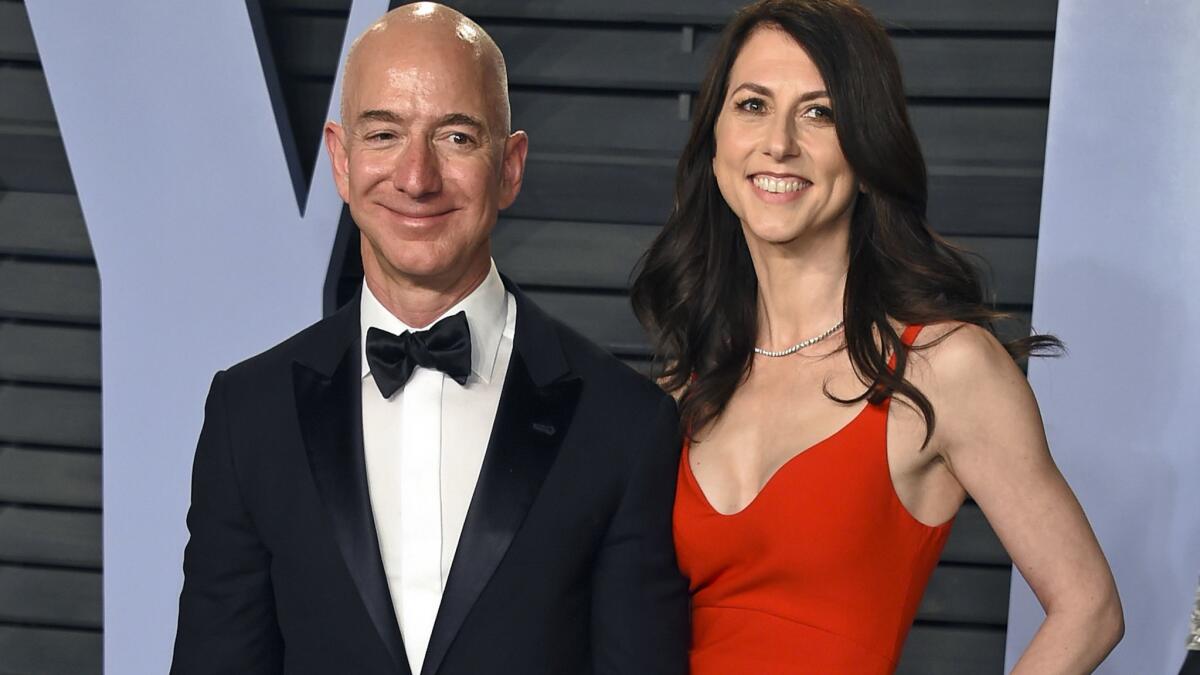 Jeff Bezos and wife MacKenzie Bezos arrive at the Vanity Fair Oscar Party in Beverly Hills on March 4.