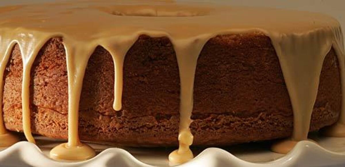 Luscious caramel glaze spills down a brown sugar pound cake, one of the many easy-to-make recipes in Southern Cakes.