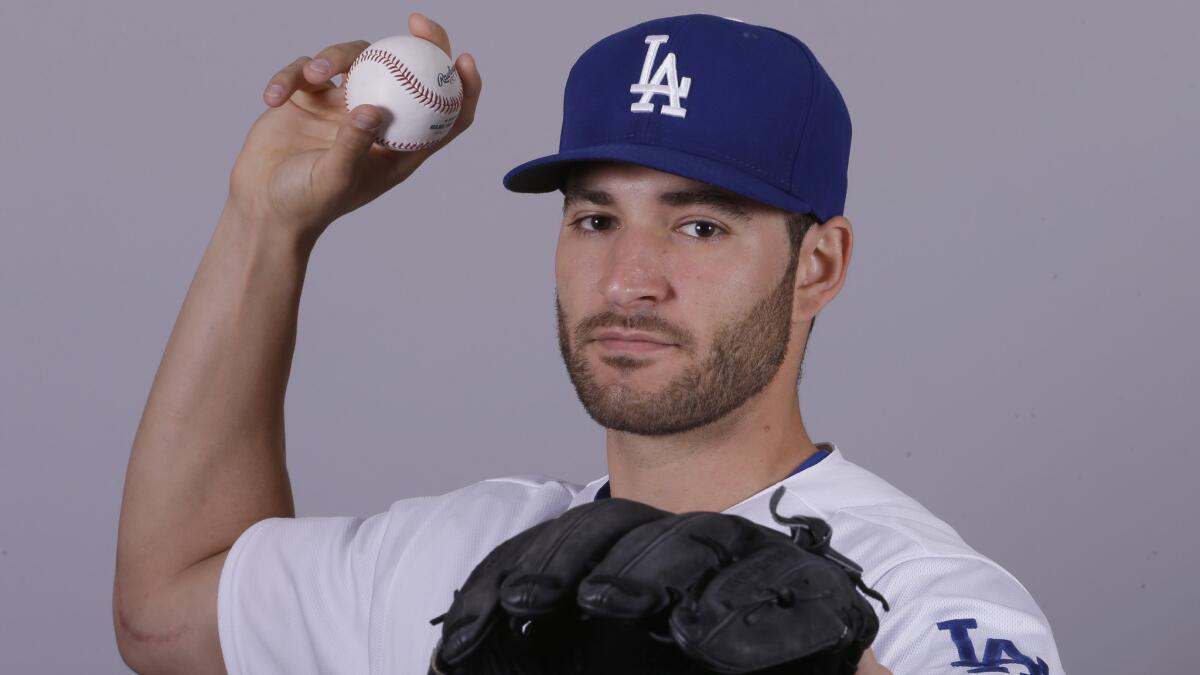 Dodgers pitcher Brandon Beachy poses for a photo during media day in spring training.