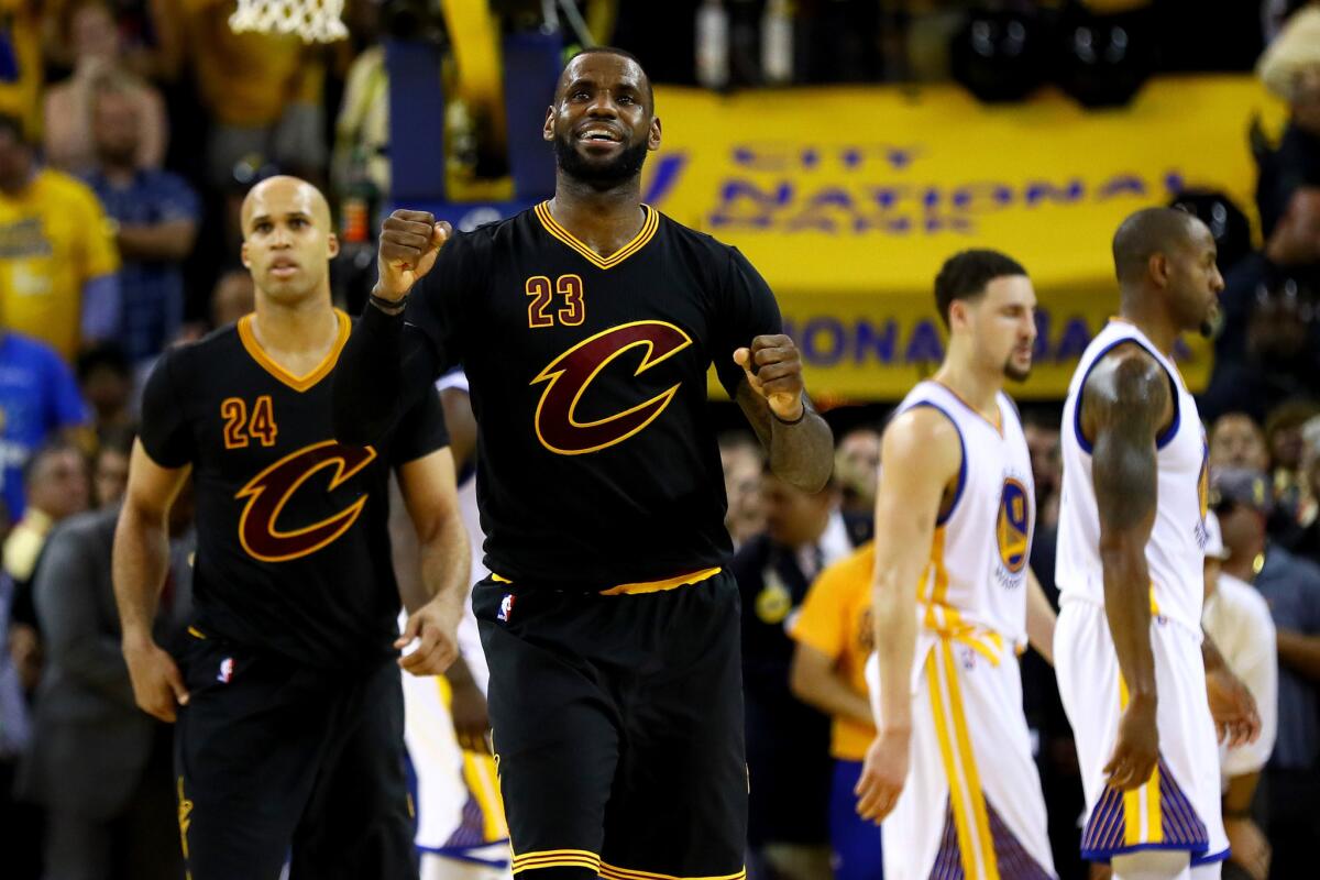 Cavaliers forward LeBron James (23) celebrates in the final moments of Game 7 of the 2016 NBA Finals.