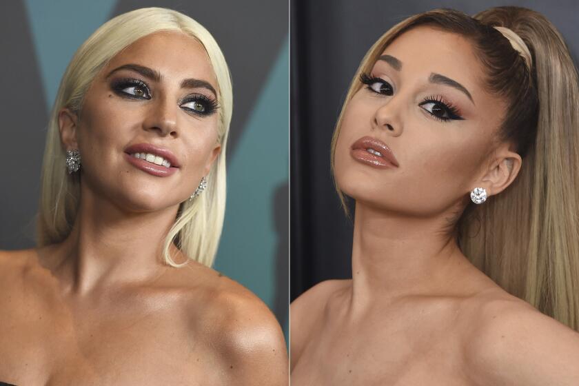 Lady Gaga arrives at the Governors Awards in Los Angeles on Nov. 18, 2018, left, and Ariana Grande arrives at the 62nd annual Grammy Awards in Los Angeles on Jan. 26, 2020. Lady Gaga and Ariana Grande both scored nine VMA nominations each, including video of the year for their No. 1 dance hit. “Rain on Me” is also competing for song of the year, best collaboration, best pop, best cinematography, best visual effects and best choreography. The 2020 MTV Video Music Awards will air live on Aug. 30 from the Barclays Center in Brooklyn.(Photos by Jordan Strauss/Invision/AP)