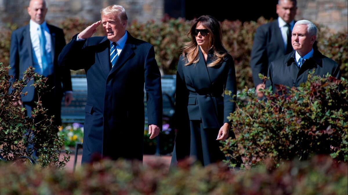 President Trump, First Lady Melania Trump and Vice President Mike Pence at Billy Graham's funeral.