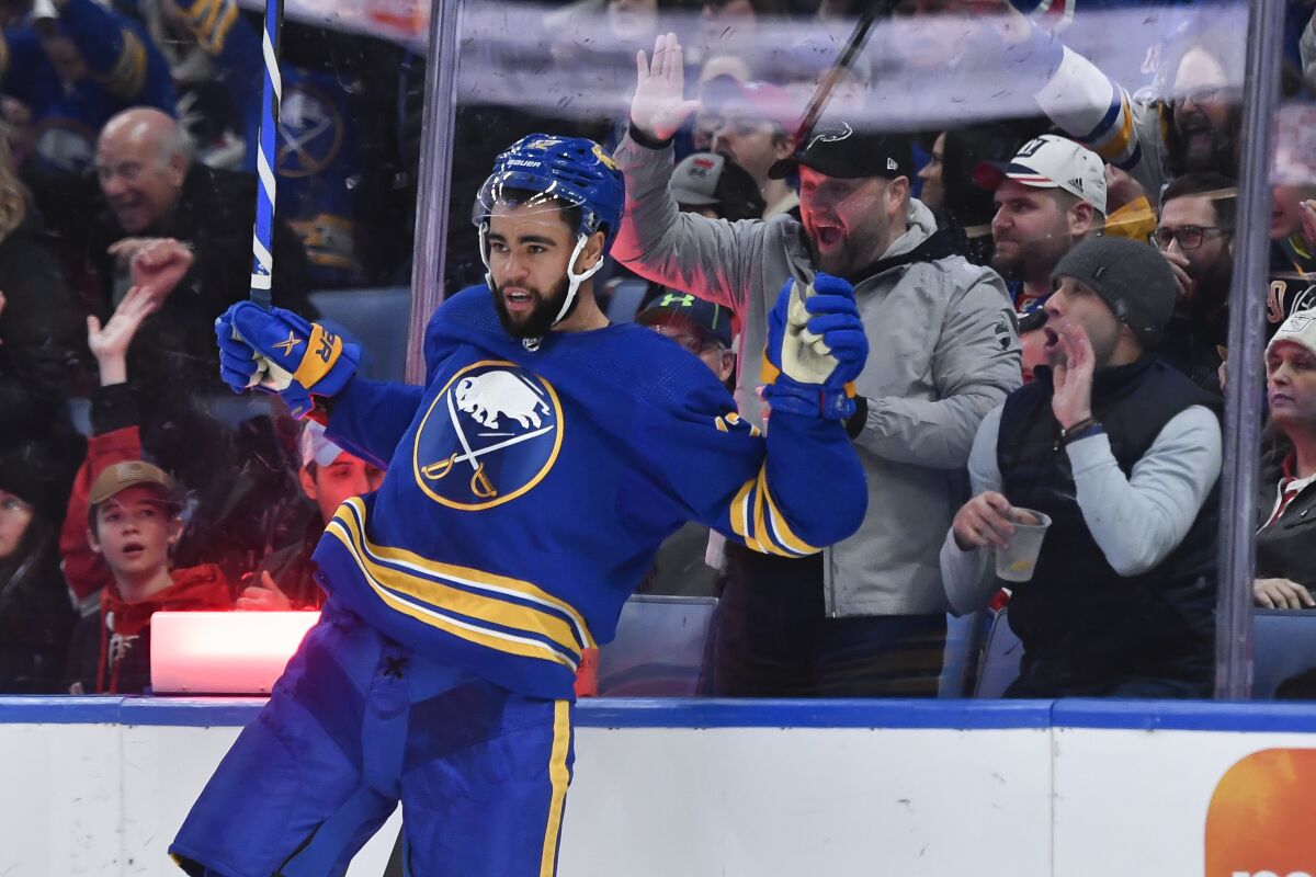 Buffalo Sabres left wing Jordan Greenway celebrates his goal against the New York Rangers during the second period of an NHL hockey game in Buffalo, N.Y., Friday, March 31, 2023. (AP Photo/Adrian Kraus)