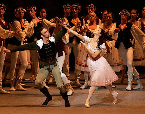 Diana Vishneva as Giselle dances with Dmitry Pykhachev as Hans, a woodsman, in the Kirov Ballet's production of the classic "Giselle."
