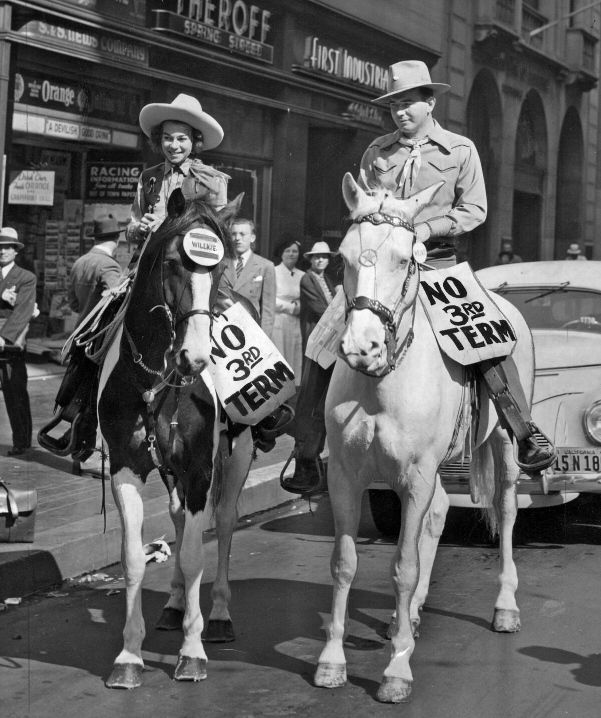 Oct. 23, 1940: Frances Voltz and Les Sachs ride down Spring Street during "No Third Term Day" observances in Los Angeles.