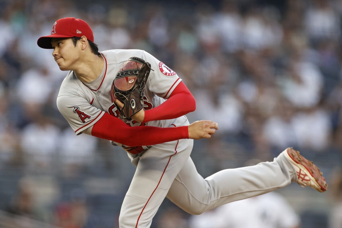 Los Angeles Angels' Shohei Ohtani follows through on a pitch during the first inning of the team's baseball game against the New York Yankees on Wednesday, June 30, 2021, in New York. (AP Photo/Adam Hunger)