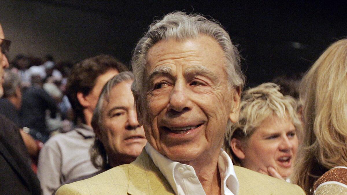 Billionaire Kirk Kerkorian is shown at the Oscar De La Hoya and Floyd Mayweather Jr. boxing match at the MGM Grand Garden Arena in Las Vegas in 2008.