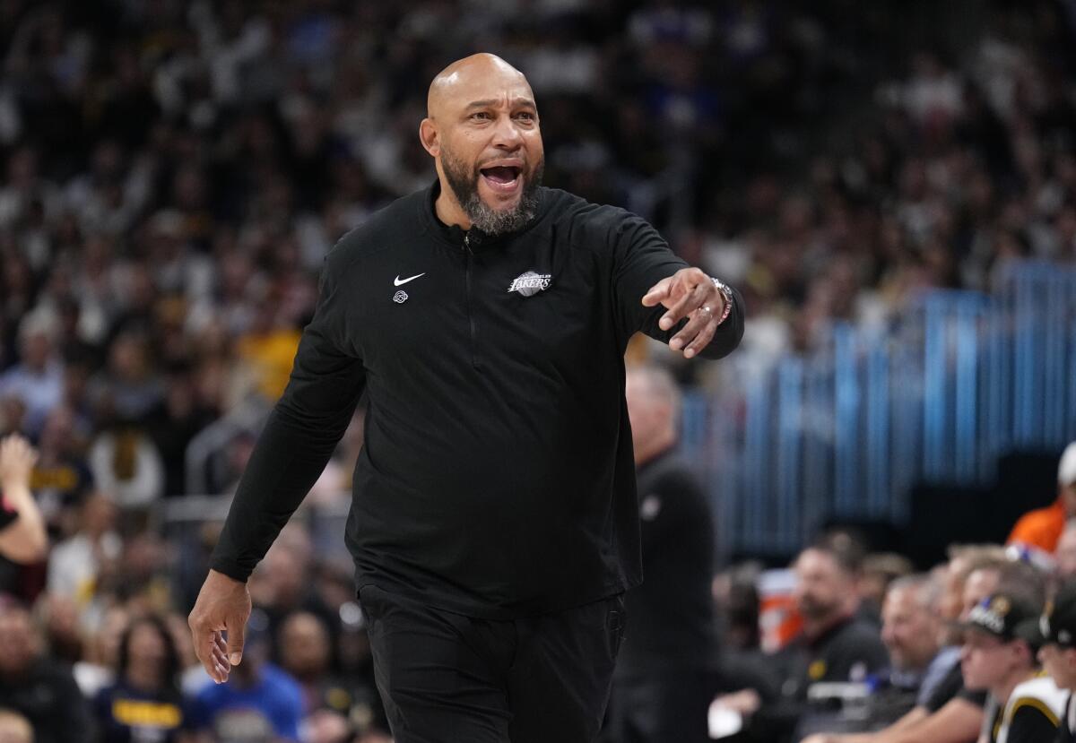 Lakers coach Darvin Ham reacts to a call during a playoff game against the Nuggets.