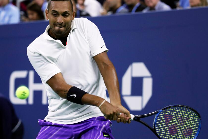 Mandatory Credit: Photo by JASON SZENES/EPA-EFE/REX (10373281x) Nick Kyrgios of Australia returns to Steve Johnson of the United States on the second day of the US Open Tennis Championships the USTA National Tennis Center in Flushing Meadows, New York, USA, 27 August 2019. The US Open runs from 26 August through 08 September. US Open Grand Slam 2019, New York, USA - 27 Aug 2019 ** Usable by LA, CT and MoD ONLY **