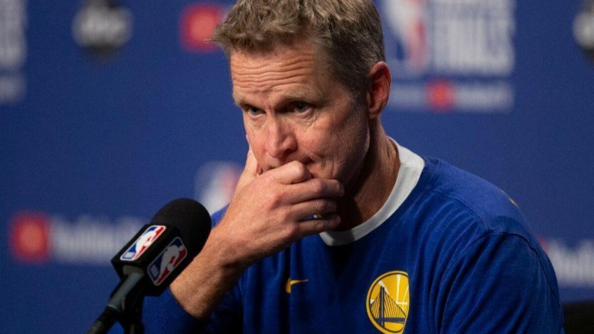 Golden State Warriors head coach Steve Kerr speaks to reporters during a news conference before practice in Toronto on Sunday. The Warriors face elimination against the Toronto Raptors in Game 5 of the NBA Finals on Monday.