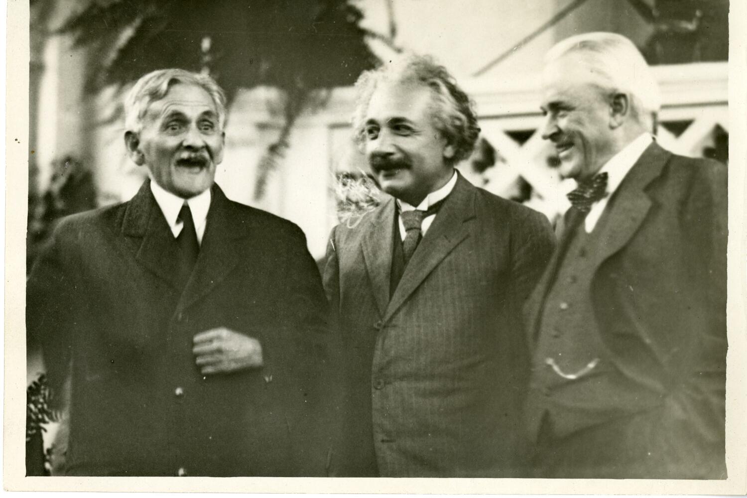 Robert A. Millikan, right, shares a light moment on the Caltech campus in 1931 with physicists Albert Einstein, center, and A.A. Michelson, left.
