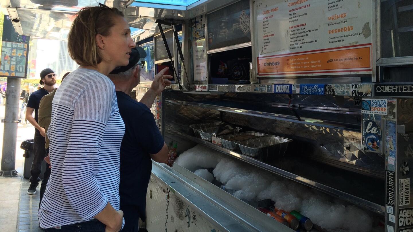 Winemaker Jen Beloz orders short rib tacos from the Kogi truck