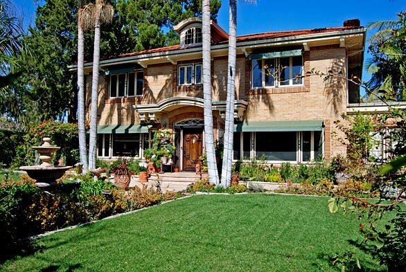 This two-story brick mansion in Old Towne Orange is listed at $1,799,995. The owners, who bought the house in 1987 for $305,000, added on 600 square feet of living space in addition to restoring the home.