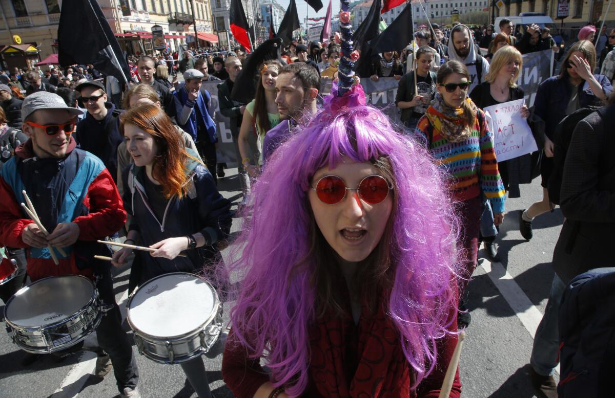 Gay rights activists march in a rally May 1 in St. Petersburg, Russia.