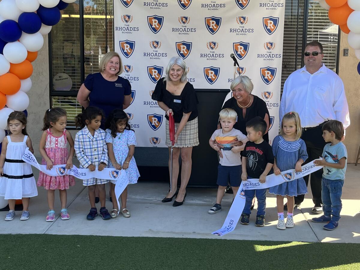 Head of School Regina McDuffie cuts the ribbon in honor of The Rhoades School's new preschool.