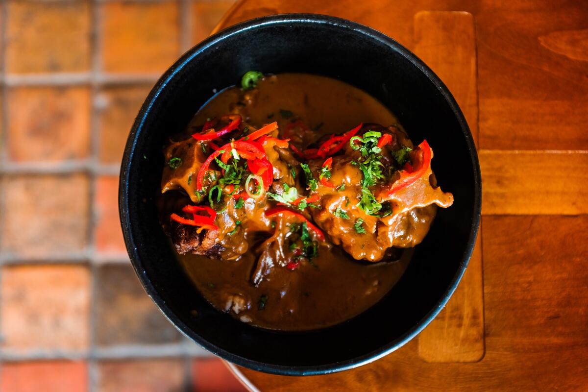 Oxtails over rice from Alta Adams