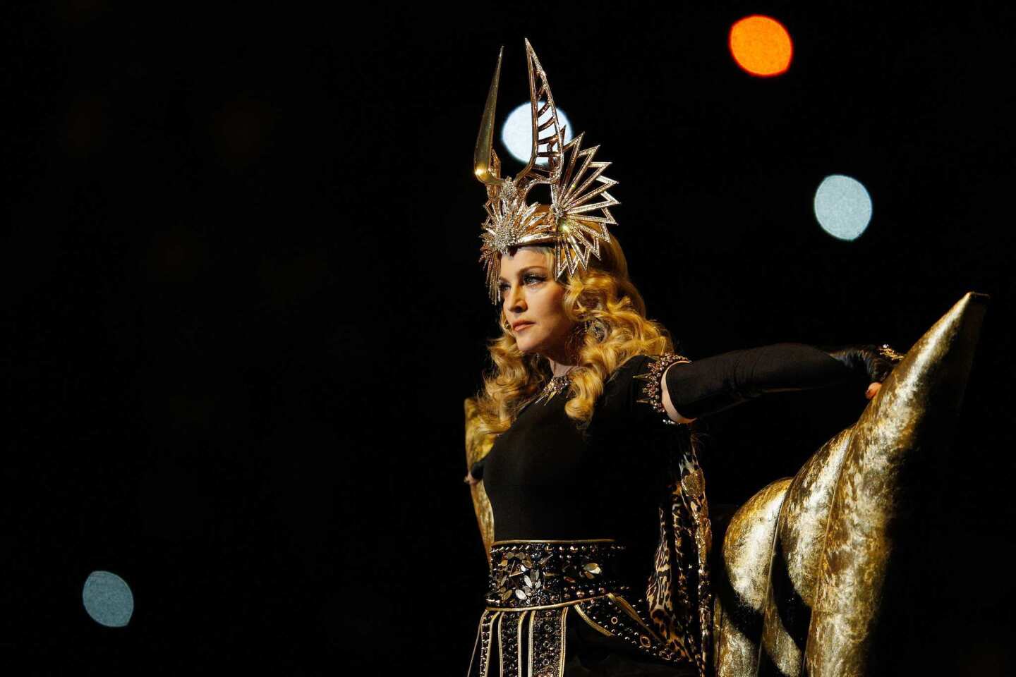 Madonna performs during the Super Bowl XLVI halftime show in Indianapolis.