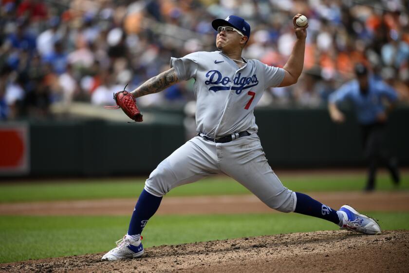 Los Angeles Dodgers'  Julio Urias pitches against the Baltimore Orioles on July 19, 2023, in Baltimore.