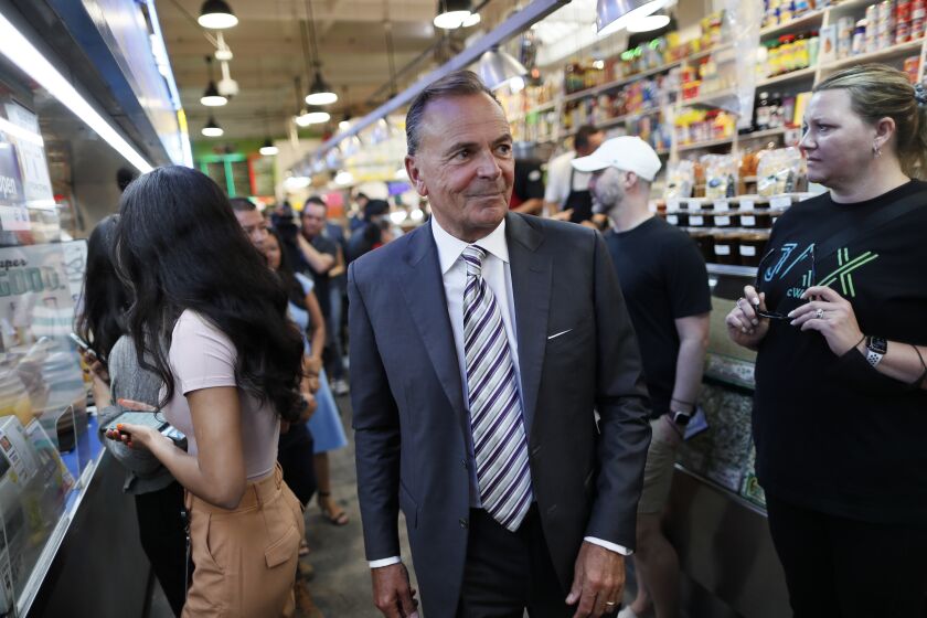 Los Angeles, CA, Thursday, June 2, 2022 - Rick Caruso tours Grand Central Market as he continues his campaign to become Mayor of LA. (Robert Gauthier/Los Angeles Times)